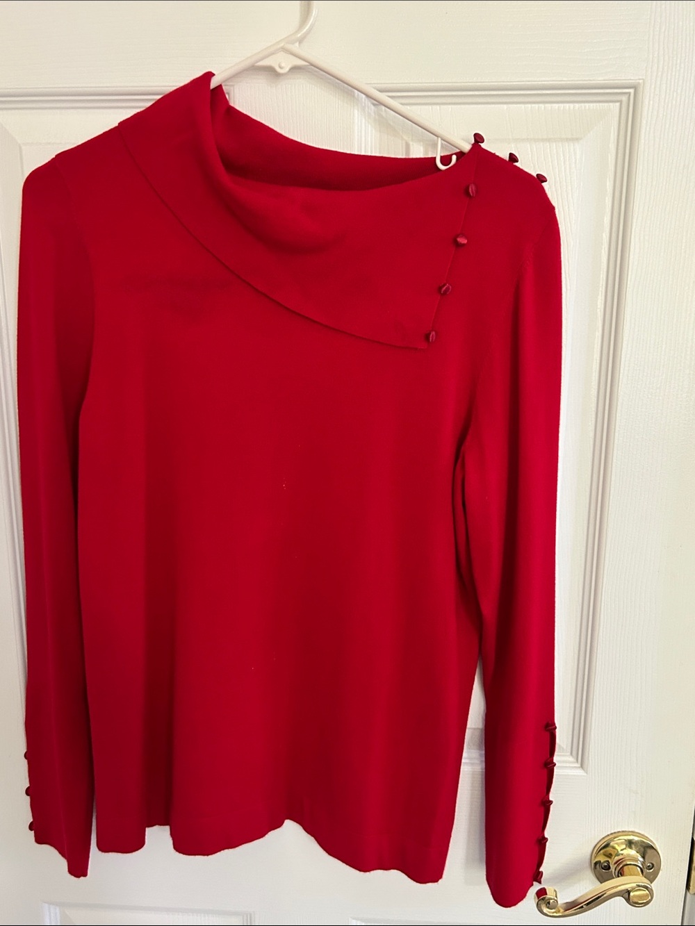 Vibrant red Etcetera knit top with wide mock neckline.